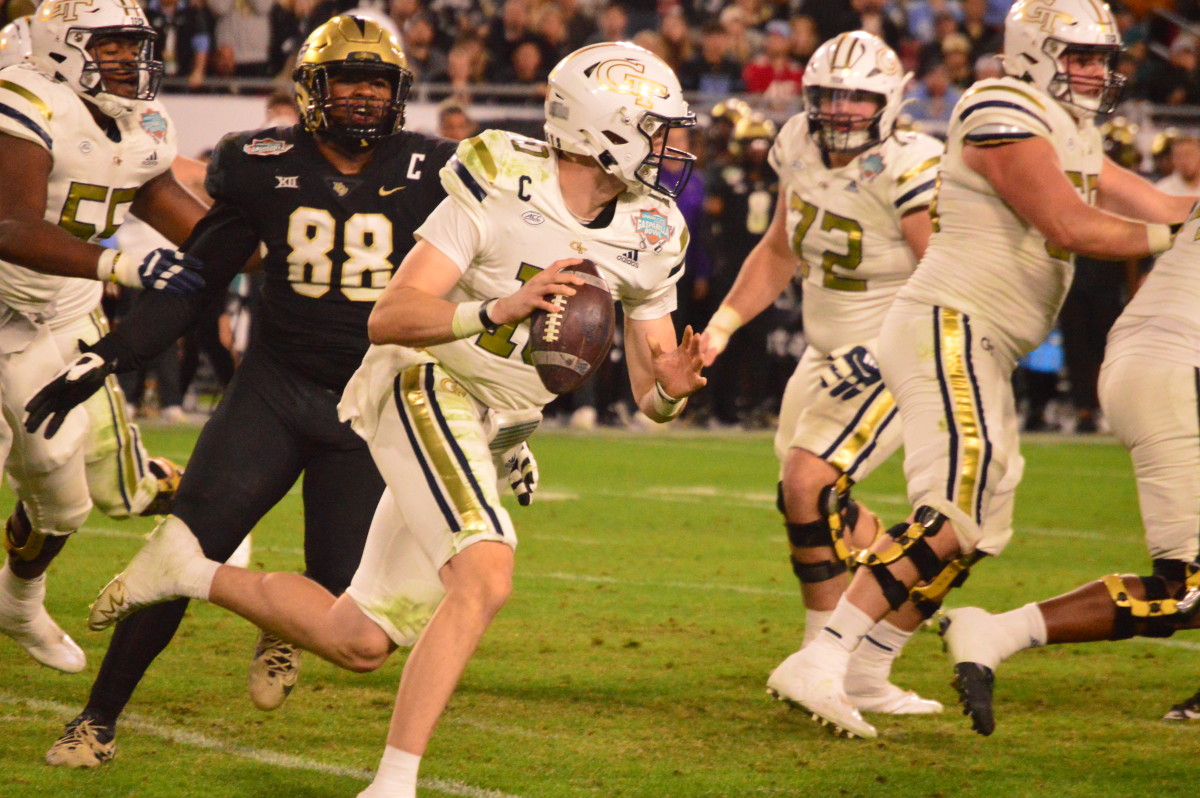 Haynes King running the ball against UCF